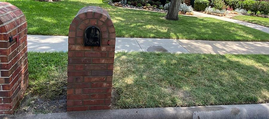 How do you repair a damaged brick mailbox?
